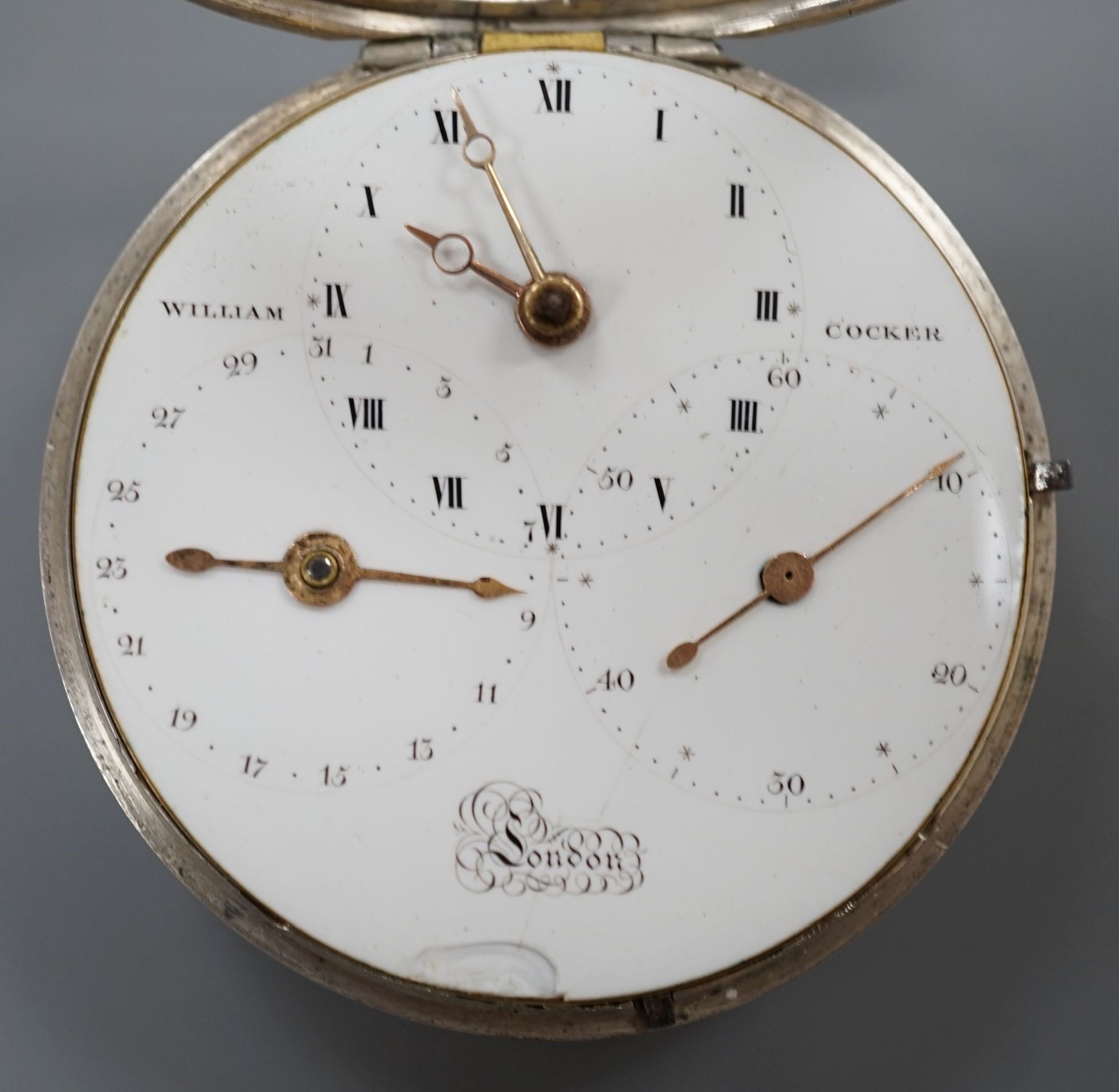 A George III silver pair case keywind pocket watch, by John Williams, Shoreditch, with unusual triple dial, retailed by William Crocker, case diameter, 48mm, the signed movement with diamond set cock.